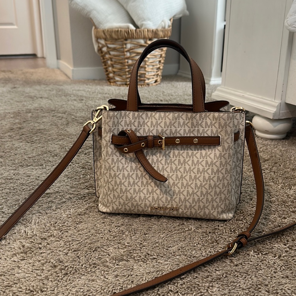 Michael kors small brown and cream colored purse with cross body strap
